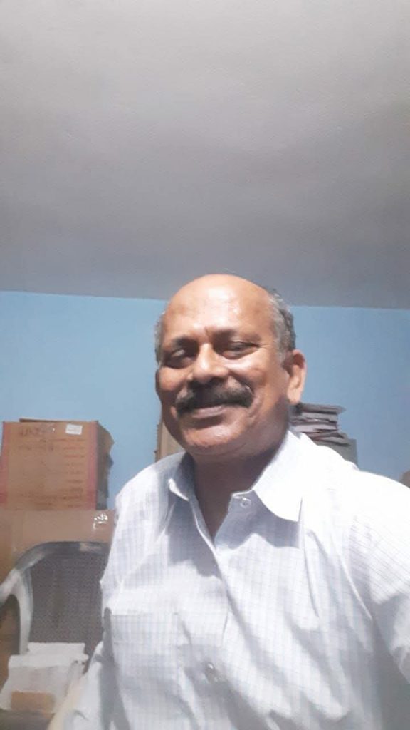 
शुगर का असरदार इलाज | Diabetes Ayurvedic Treatment.  Pic of Vaidya Ajit Karan in his clinic. Online treatment by parcel, packets visible.